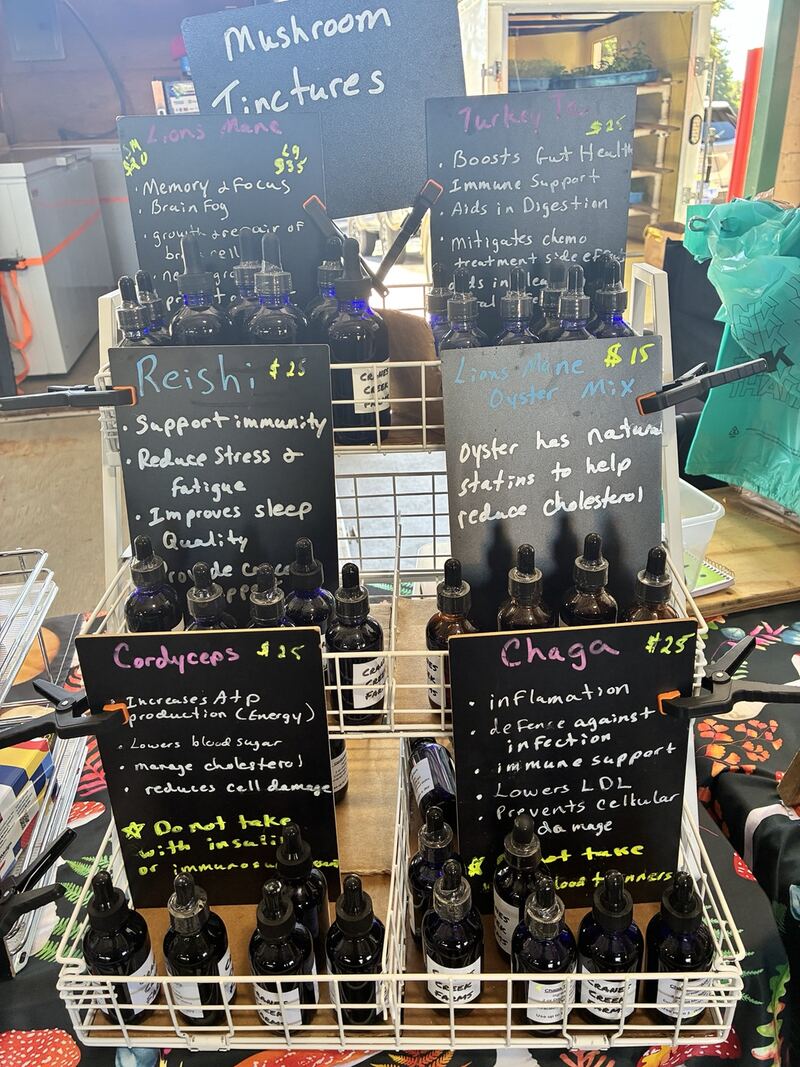A handwritten display board inside the market.