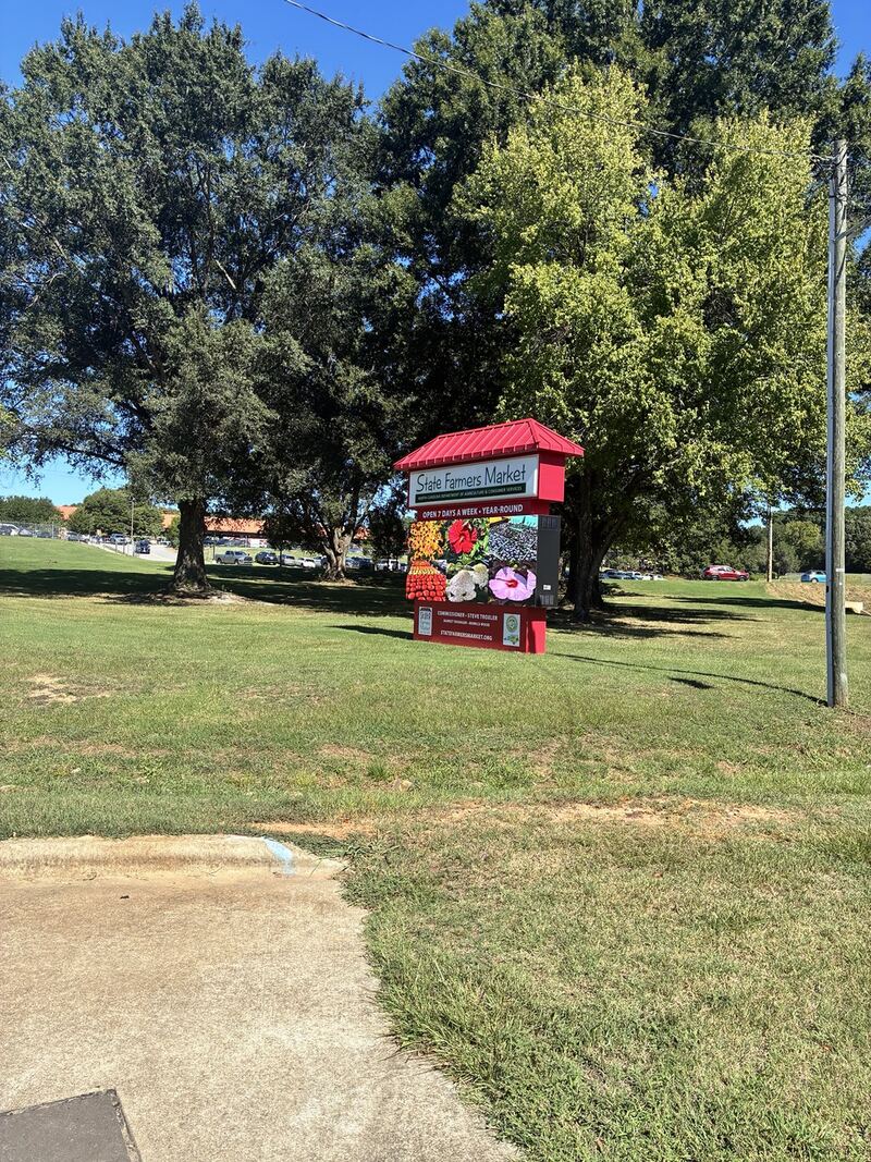 Another view of the roadside market sign.